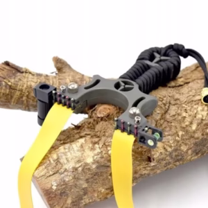 Лазерна прашка с нивелир подпряна на дърво